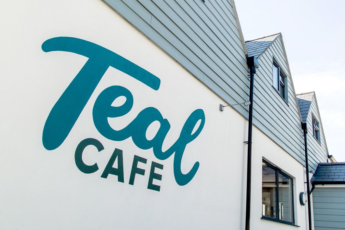 The Teal Cafe sign
